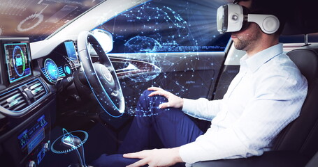 Image of network of connections over businessman wearing vr headset in self driving car