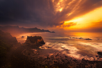 sunrise over the beach at Pantai Menganti Kebumen Central of Java Indonesia