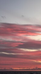 Fototapeta premium sunset over the sea, pink cloud