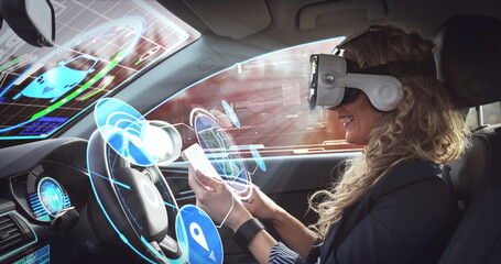 Image of digital icons over woman wearing vr headset in self driving car
