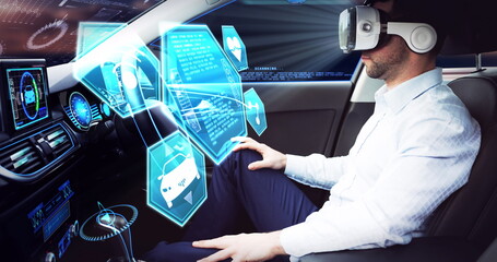 Image of icons over businessman wearing vr headset in self driving car