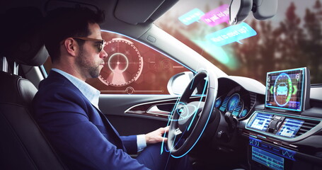 Image of digital interface over businessman in self driving car