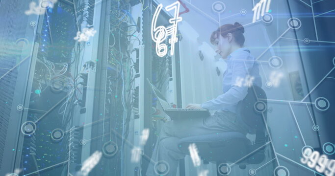 Image of floating numbers over caucasian woman working in a server room