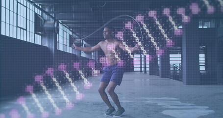Digital composite image of dna stricture spinning against african american man jumping rope