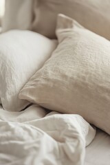 Soft linen pillows and bedding, cozy bedroom
