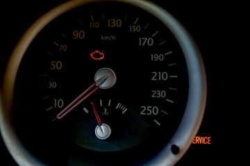 engine malfunction light on the dashboard of a car