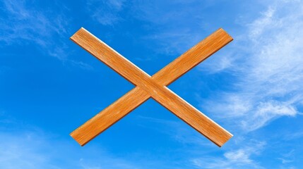 Rustic Wooden Cross Against Azure Sky