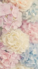 A soft-focus floral background with blurred petals and neutral, warm lighting