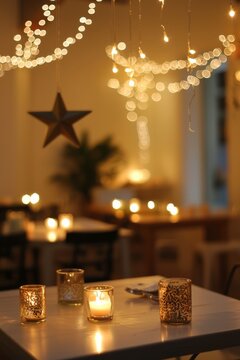 The breakroom decorated with delicate Ramadan lights and hanging star ornaments. Small candles add warmth to the tables