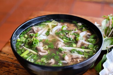 A bowl of North Vietnamese-style pho tai lan with beef cooked in tallow and garlic at VN Street Foods, a Vietnamese street food restaurant in Sydney’s inner west - Marrickville, NSW 
