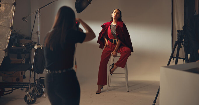 Photoshoot, photographer and model on set, fashion and pictures for magazine in studio and production. Backstage, creative and tech for project in media agency, camera and equipment for photography