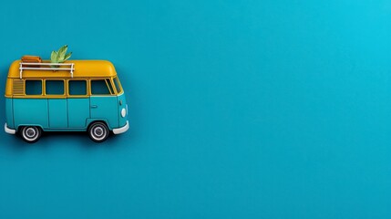 Blue and Yellow Vintage Camper Van on Light Blue Background