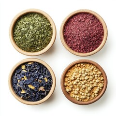 Dry red paprika and green oregano spices in a white bowl are healthy cooking ingredients