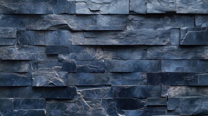 Textured dark navy blue stone wall with intricate grunge patterns, creating a modern abstract feel.