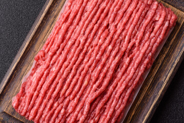 Raw ground beef or pork with salt and spices