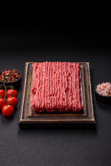 Raw ground beef or pork with salt and spices