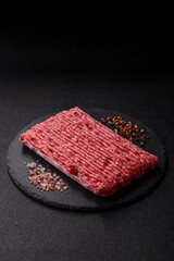 Raw ground beef or pork with salt and spices