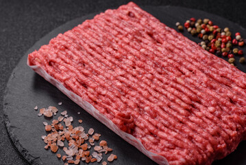 Raw ground beef or pork with salt and spices