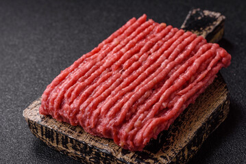 Raw ground beef or pork with salt and spices
