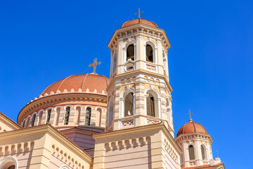 A large building with a dome and two towers