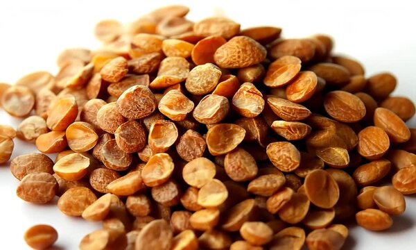 Pile of Cut Golden Brown Roasted Peanuts in a Heap on White Background Close Up Studio Shot Overhead View