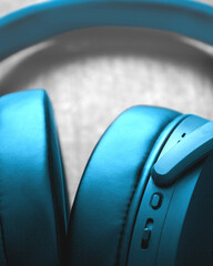 Beautiful, black, full-size headphones on a light background.