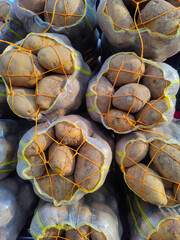 potatoes packed in sacks, ready for sale