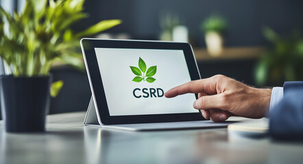CSRD Compliance Businessperson Using Tablet to Access Sustainability Reporting Information