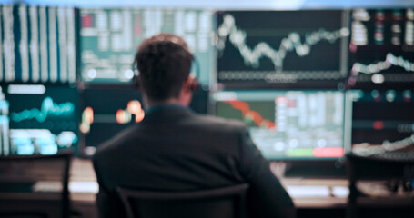 Computer, finance and blur of man for stock market, financial analytics and trading review. Call center, business and back of person with monitor for online investment, revenue charts and statistics