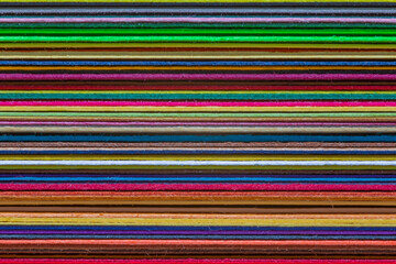 close up of stack of color paper for design and art