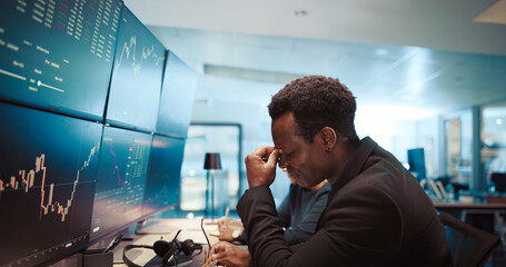 Man, headache and stock market trading with monitor in office, stress and mistake with value crash....