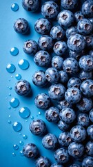 Fresh and Juicy Blueberries with Water Droplets on a Vibrant Blue Background for Healthy Food Concept and Recipe Inspiration