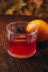 beautiful cocktails in warm colors on a flower background. cocktail or bar menu concept.