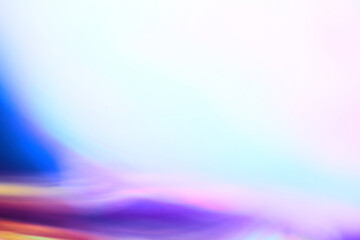 Abstract background with blurred focus in shades of translucent rainbow