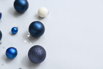 Different Christmas balls on white background