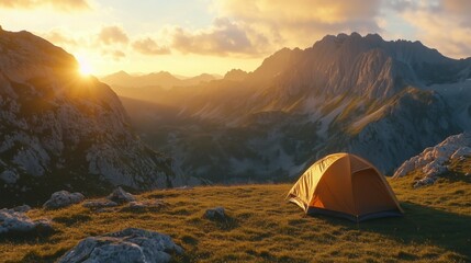 Camping tent at sunset in mountainous landscape  