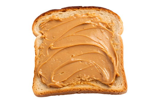 Slices of Bread Topped with Peanut Butter on a Plain Background.
