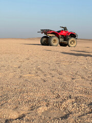 Obraz premium A quad bike on the desert in a sunny afternoon at Hurghada, Egypt