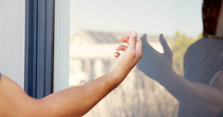Hand, person and knocking on door of house for entrance, arrival alert and respect for visit of homeowner. Guest, glass and reflection with announcement, attention and waiting for entry permission