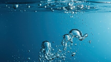 Bubbles in underwater liquid creating ripples and reflections, showcasing purity and tranquility of nature