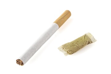 Close-up of Snus Nicotine pouch next to a Cigarette, isolated on white. 