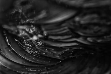 black background, paint or oil, abstract black smeared backdrop, texture oil