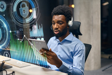 Cybersecurity Engineer Using Modern Data Visualization Technology and Tools in Office Environment
