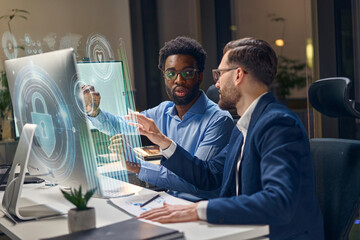 Collaboration On Cybersecurity Strategies By Professionals In A Modern Office Setting.