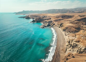 Top view of beautiful turquoise sea water and sandy beach with waves, aerial photography on a sunny day, nature background for summer vacation concept,