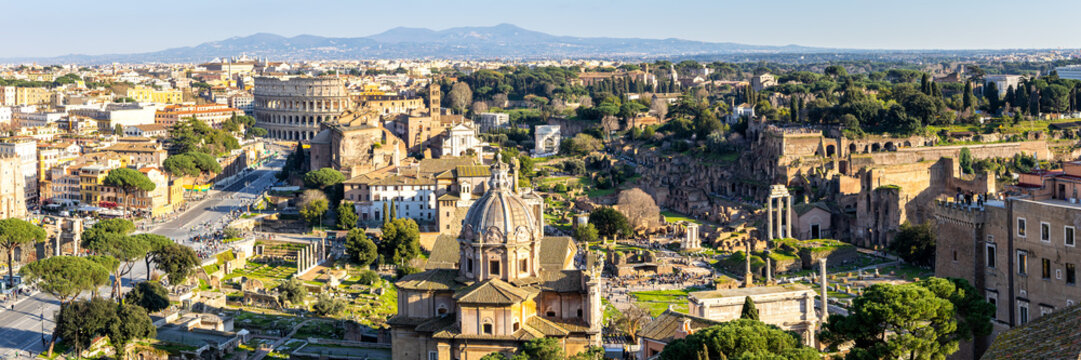 Rome skyline Roman Forum and Colosseum aerial view panorama ancient historical temple ruins in Italy - Powered by Adobe