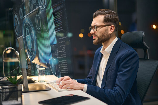 Professional Analyst Using Modern Technology For Cybersecurity Solutions In Contemporary Work Environment.