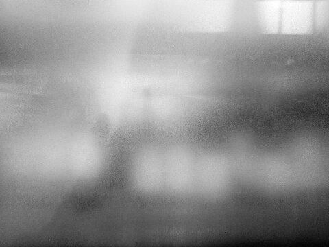Old Grunge Frosted Glass Wall Background with Empty Room Reflection.