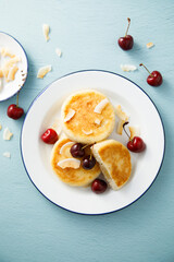 Banana cottage cheese cakes with cherries and almond