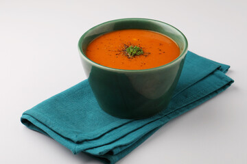 Tomato soup made with tomato, carrot, and ginger